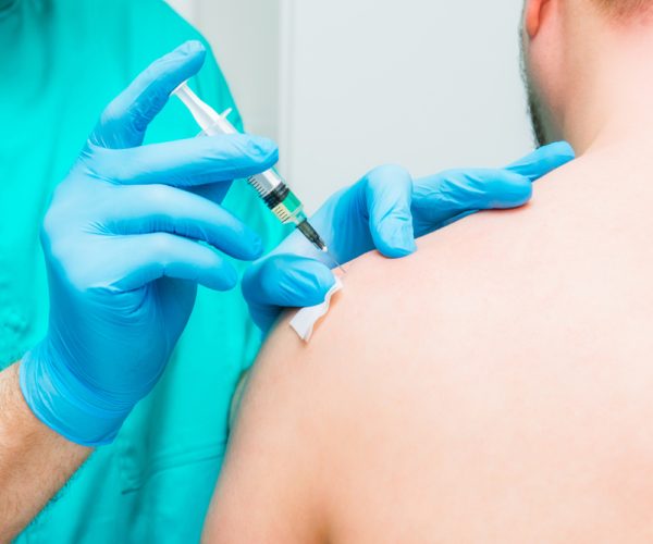 Shoulder Injections Close,Up,Neurologist,Doctor,Makes,An,Injection,Therapy,,Blockade,Into